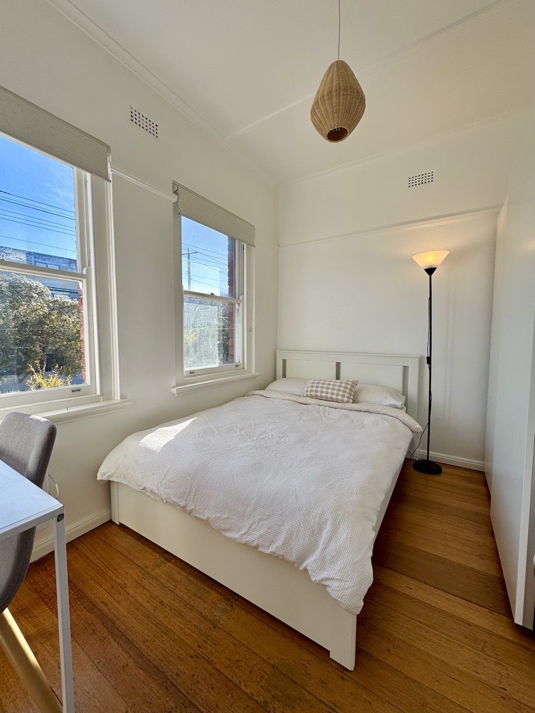 Light-filled furnished bedroom